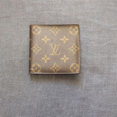 louis vuitton mens wallet repair|louis vuitton repairs near me.